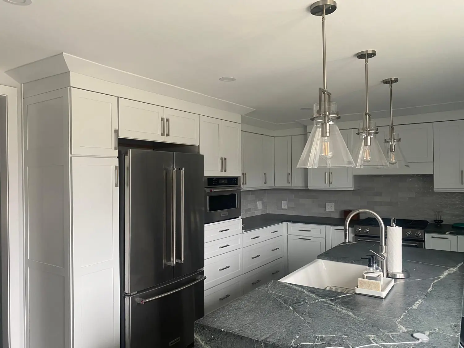 Finished kitchen remodel by Waterfront Construction in Mansfield, MA